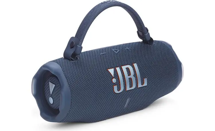 Compact blue portable speaker with fabric covering, carrying handle, and prominent JBL logo on the front